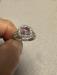 Pink sapphire and diamond ring set in 14k white gold