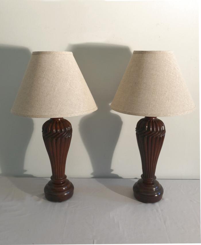 Pair of carved Indian padouk wood lamps