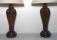 Pair of carved Indian padouk wood lamps