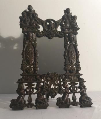 Image of Antique Centennial commemorative cast iron dresser mirror