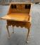 Eldred Wheeler tiger maple desk in Queen Anne style