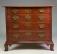 Eldred Wheeler cherry wood oxbow chest of drawers 20thc