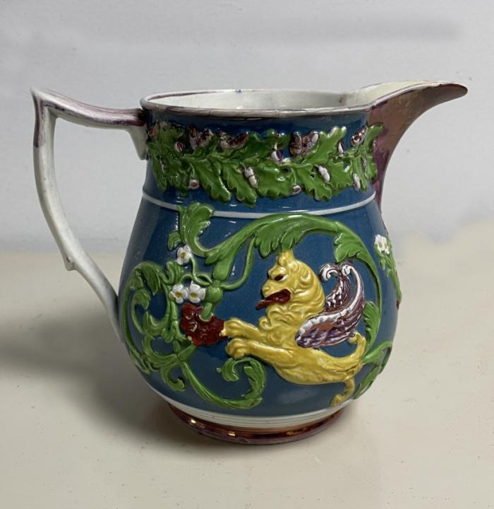 Staffordshire purple luster pitcher with griffon c1830
