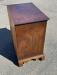 Diminutive tiger maple four drawer chest