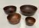Set of four graduated burl wood bowls