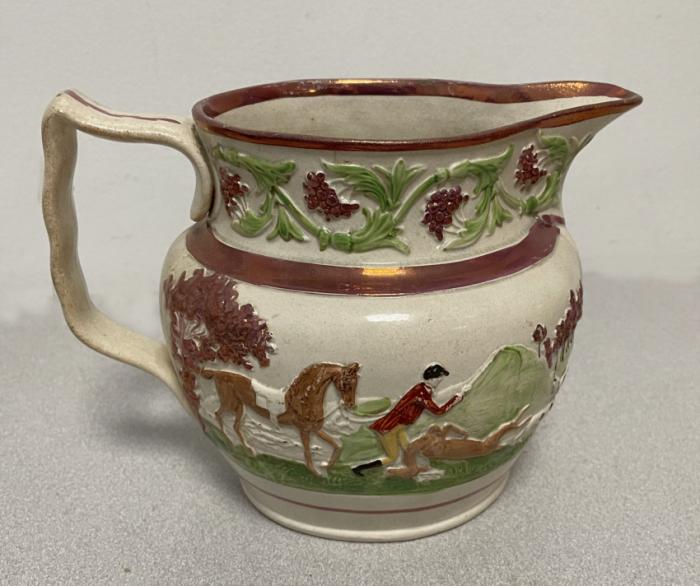 Staffordshire pink luster jug with hunt scene c1820