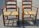 Shaker style pair of cherry arm chairs with rush seats
