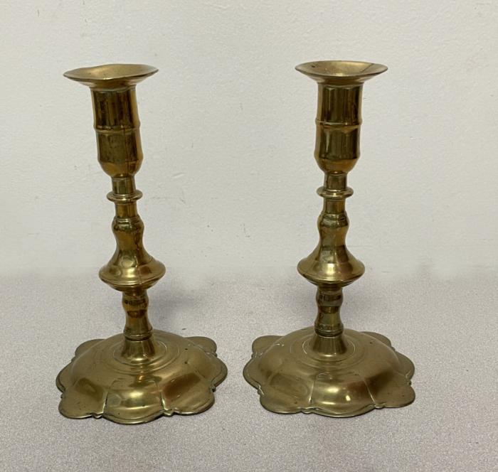 18thc English brass candlesticks on petal bases