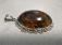 Large amber and silver pendant made in Mexico