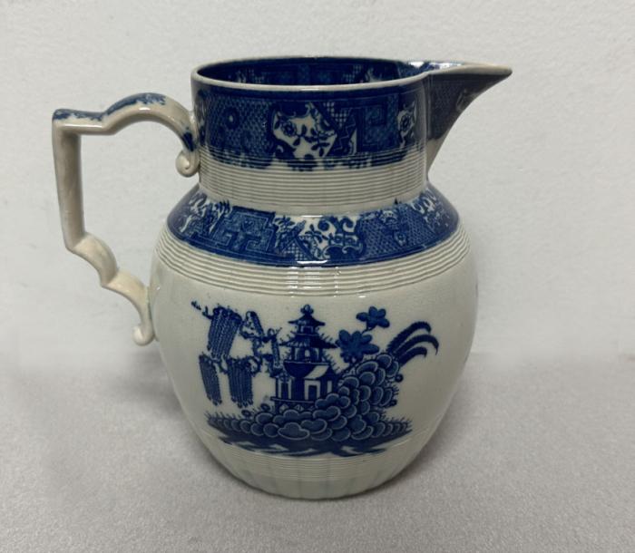 Blue and white Staffordshire pitcher in Chinoiserie pattern