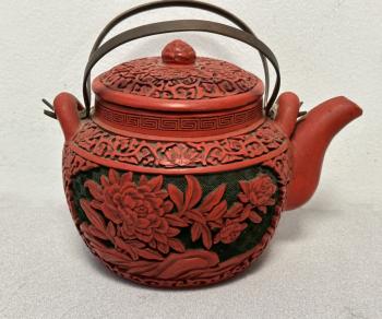Image of Chinese cinnabar over earthenware teapot