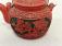Chinese cinnabar over earthenware teapot