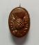 Antique copper top baking mold in thistle motif