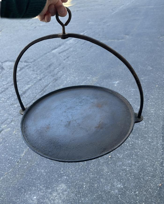 Early hanging cast iron hearth griddle c1830