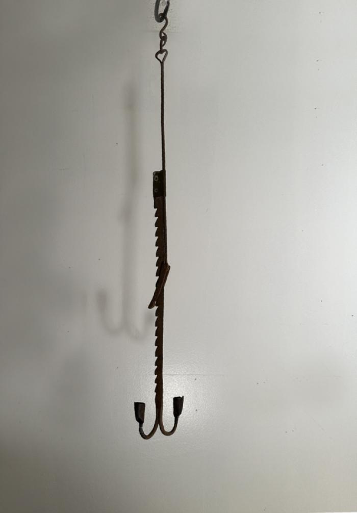 Early iron adjustable pendant candle holder