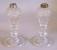 Pair glass oil lamps in diamond pattern on candlestick bases