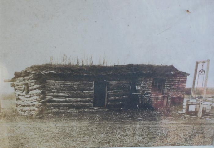 19th century photograph of log cabin