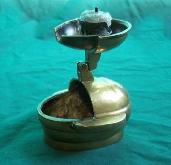 Image of Early antique Chinese bronze travel candle stick with silver inlay