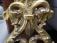 Large antique English brass door knocker with dolphins and figures